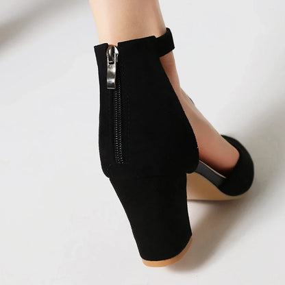 Stylish women's block heels, side view. Elegant open toe, t-strap, and stable heel design for comfortable formal wear.
