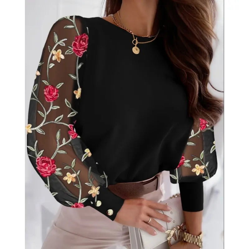 Black sheer sleeve appliqué blouse for women. Elegant long sleeve, round neck top, ideal for stylish party & dressy wear.