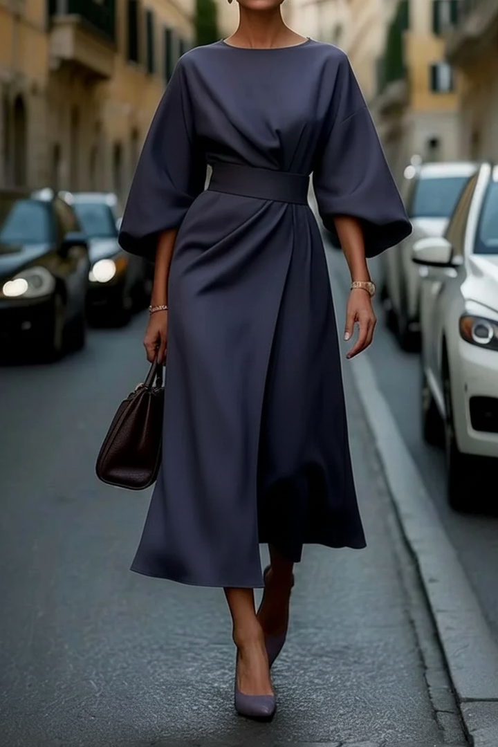 Sophisticated women's formal midi dress, ideal for cocktail events. Classic black, elegant silhouette.