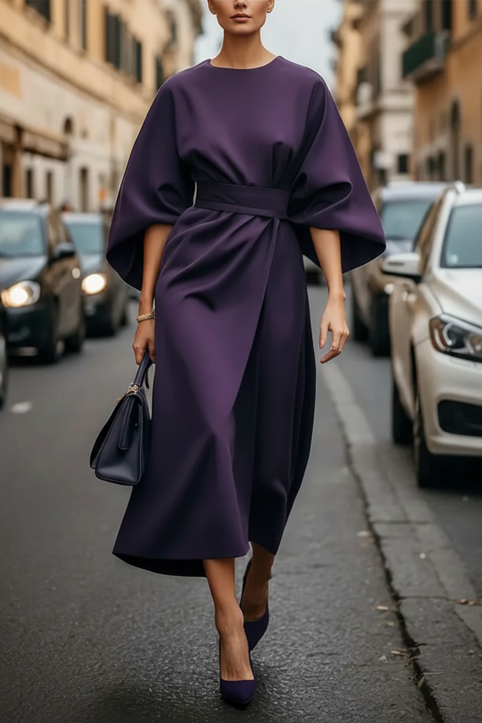 Classic black women's fashion midi dress. Elegant cocktail style, perfect for formal and party wear.