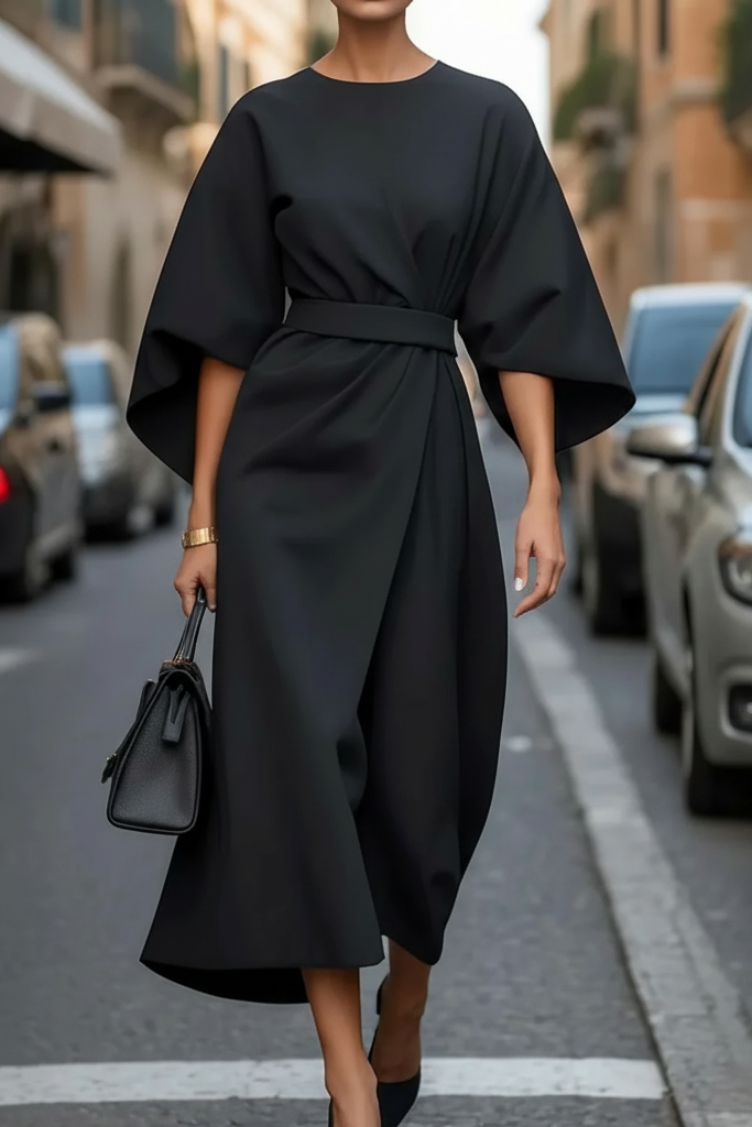 Classic women's elegant black dress for cocktail parties & formal evenings. Midi style special occasion wear.