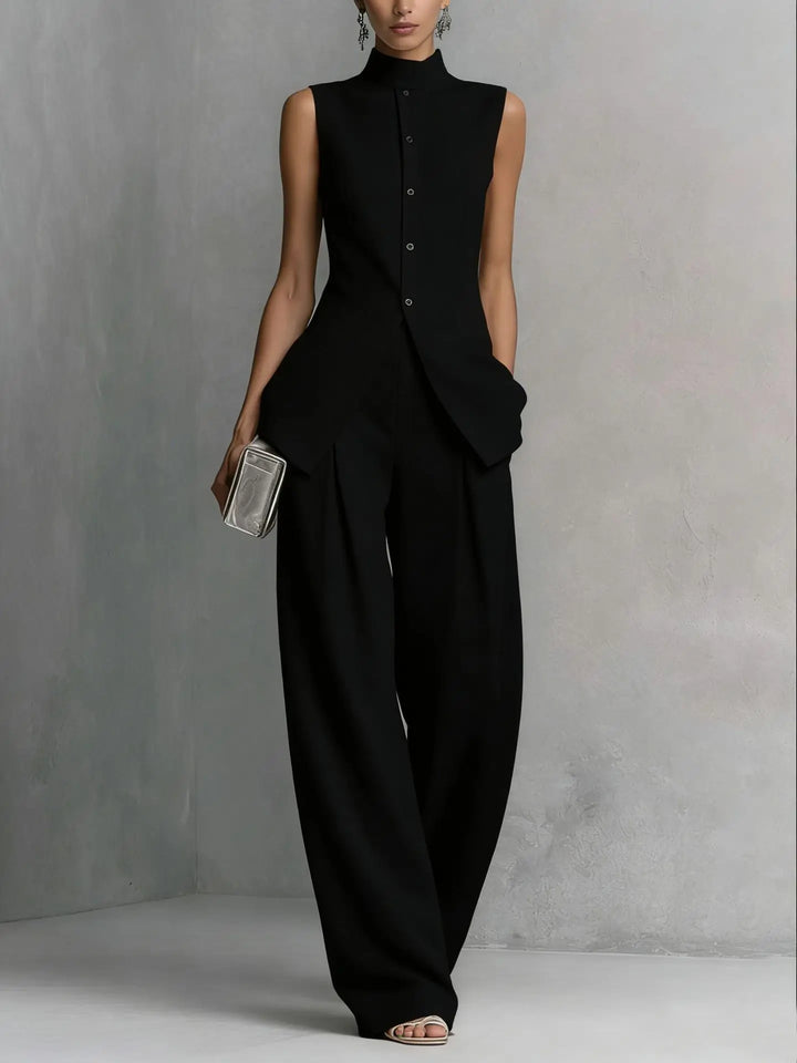 Elegant women's black high neck wide leg jumpsuit, perfect for formal events or office wear. Sophisticated sleeveless.