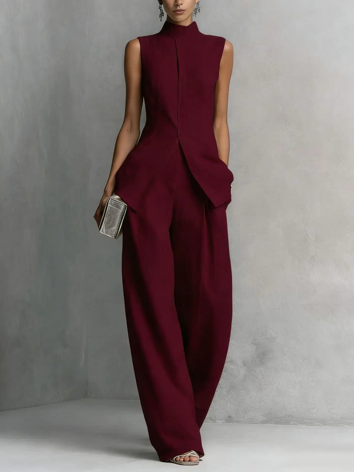 Sophisticated women's 2-piece wide leg jumpsuit set in black, featuring an elegant high neck and sleeveless design.