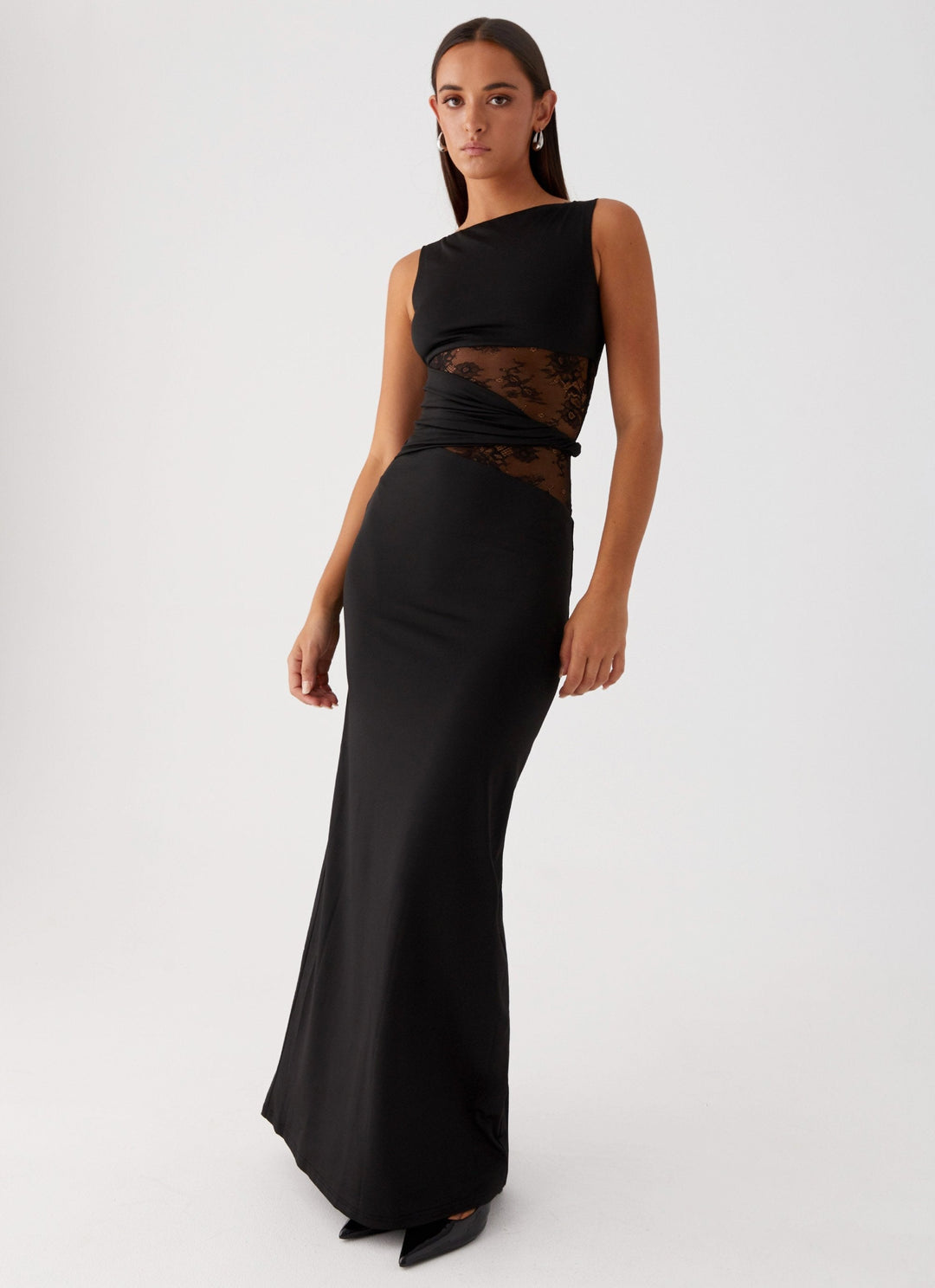 Black sleeveless lace maxi dress for women, an elegant formal evening gown with chic cut-outs for special occasions.