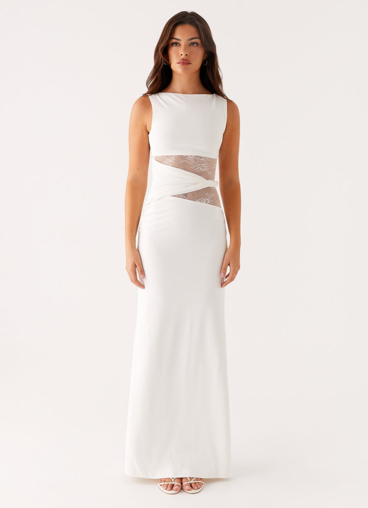 Beautiful formal evening gown for women, a sophisticated maxi dress with lace, cut-outs & an elegant boat neck.