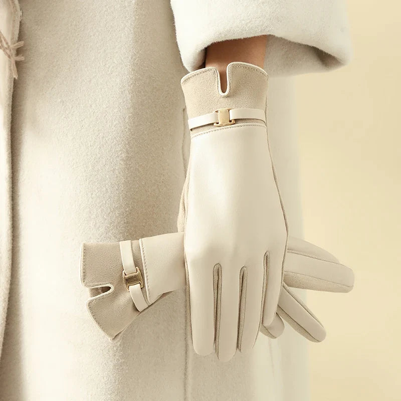 Chic women's leather touchscreen gloves for winter, stylish accessory for warmth & phone use.