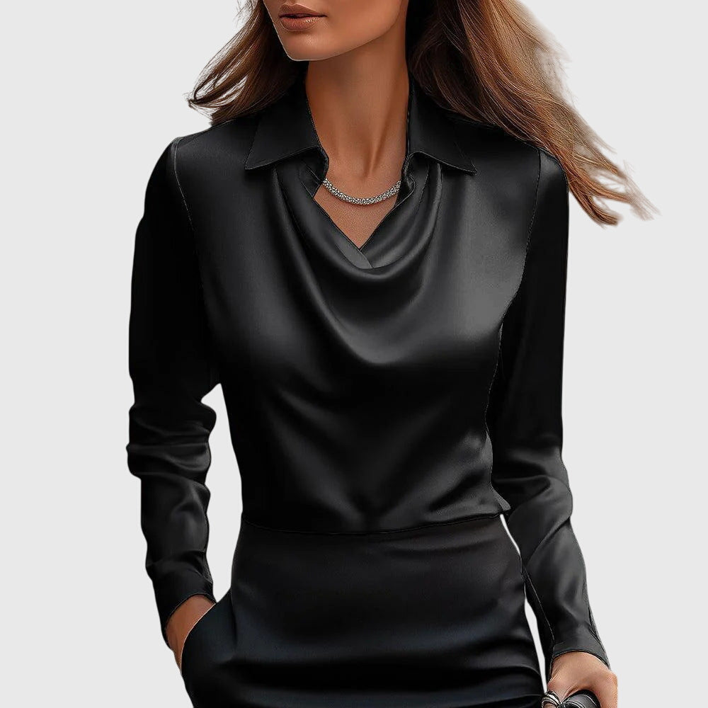 Stylish silver pleated women's blouse. Versatile fashion top with an elegant flowing fit.