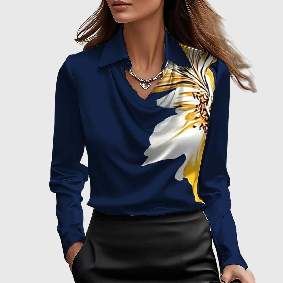Women's elegant pleated blouse. Flowing fit, chic style, versatile for dressy or casual looks.