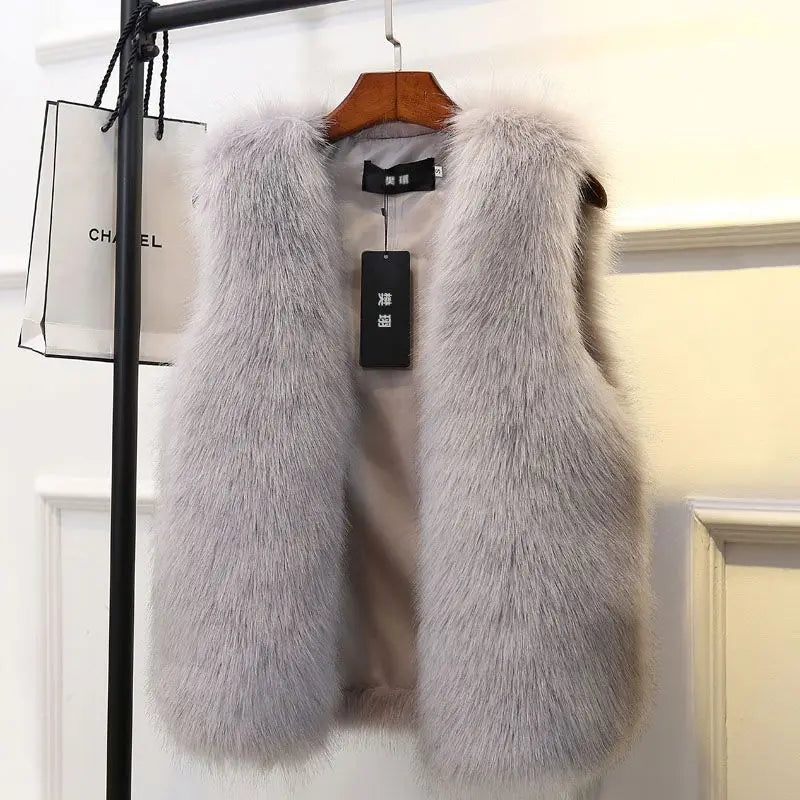 Stylish women's winter vest in black or beige. Elegant sleeveless outerwear, perfect for warm layering.