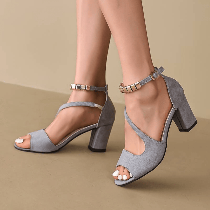 Stylish women's block heel dress sandals with adjustable strap for stable and comfortable wear at parties.