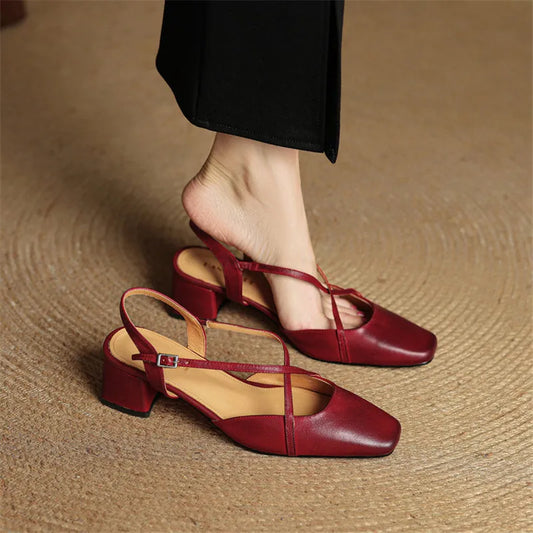 Elegant women's block heels with adjustable strap for secure, comfortable fit.
