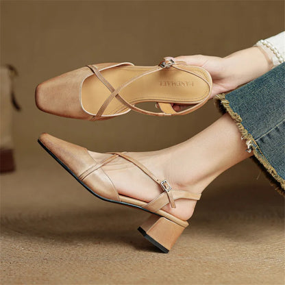 Sophisticated black women's block heels, closed toe formal shoes with an adjustable strap for secure wear.