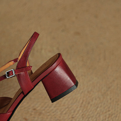 Elegant formal women's block heels with closed toe and adjustable strap, ideal for special occasions.