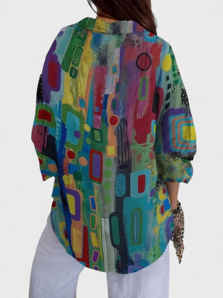 Chic women's long-sleeve geometric pattern blouse, versatile for elegant office or casual sophisticated style.