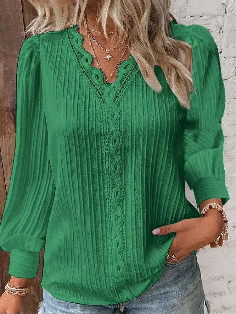 Feminine women's lace top for elegant spring & summer style, a sophisticated addition to any wardrobe.