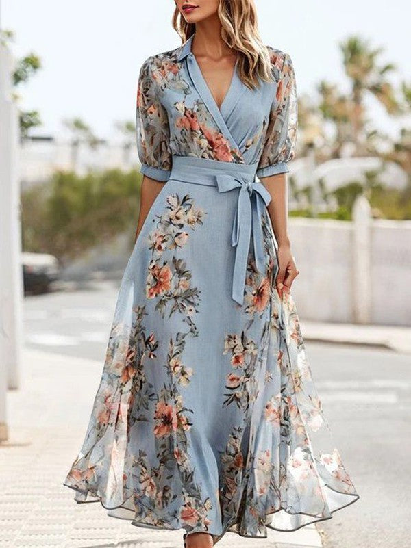Elegant women's blue floral wrap maxi dress with V-neck, puff sleeves, and tie waist, perfect for summer parties.