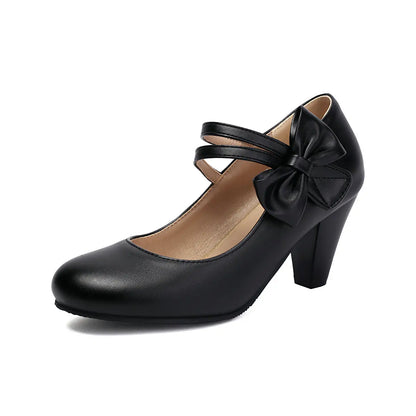 Elegant bow accent block heels for women. A comfortable and stylish footwear option for any occasion.