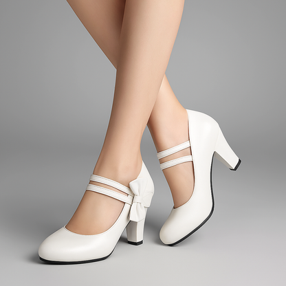 Fashionable women's party heels featuring a chic bow accent and stable block heel for comfort.