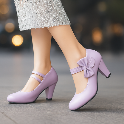 Chic women's dress shoes: block heels with a delicate bow and comfortable ankle strap. Ideal for fashion.