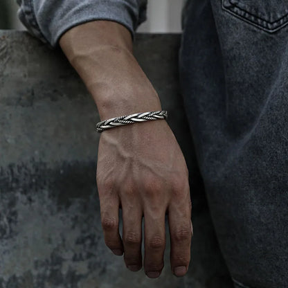Stylish women's braided cuff bracelet. Vintage look adjustable jewelry, a perfect elegant fashion accessory.