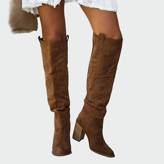 Elegant women's brown knee-high orthopedic boots with comfortable support, perfect for fall and winter fashion.