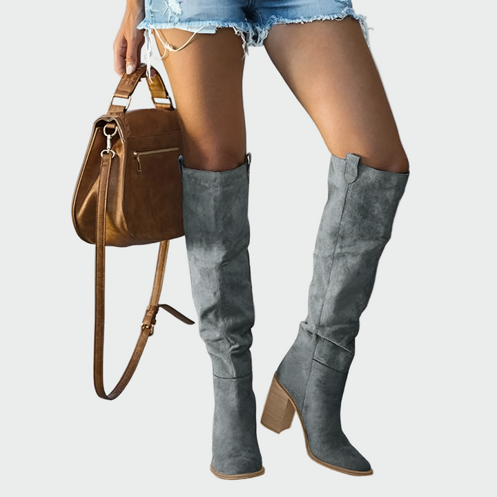 Stylish gray tall women's orthopedic knee-high boots, offering comfort and support for chic fall fashion.