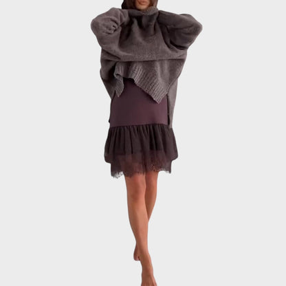 Brown women's sweater and matching slip dress set. A chic two-piece outfit for elegant autumn and winter style.