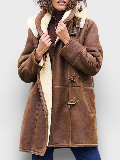 Elegant women's brown winter coat, timeless style for warmth & fashion in cold weather. Classic outerwear.