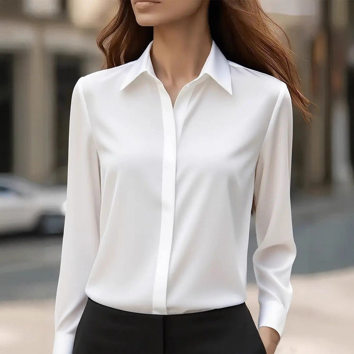 Stylish business casual women's blouse. Button-front, sophisticated long sleeve top for work & office.