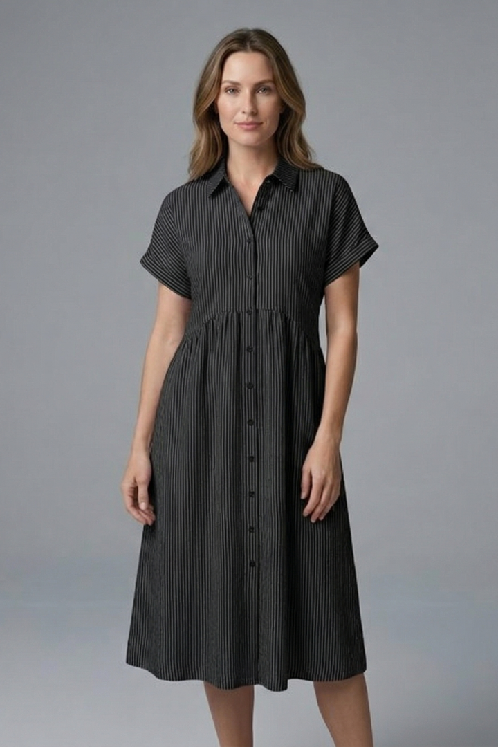 Sophisticated women's button-front midi dress with elegant collar, great for office or day fashion.