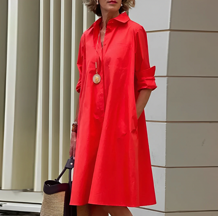Elegant women's button-front shirt mini dress with a relaxed fit, perfect for day or evening wear.