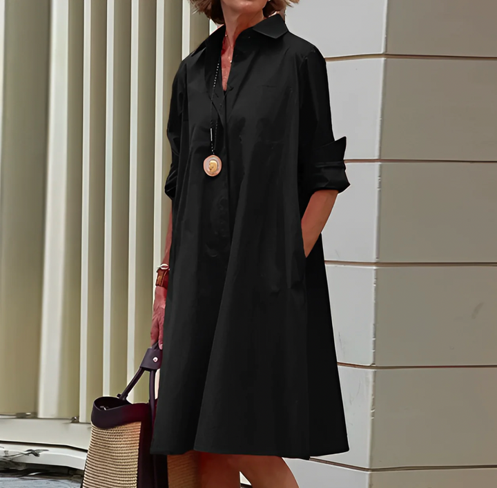 Comfortable women's relaxed fit button-front shirt mini dress, an elegant and casual design for modern fashion.