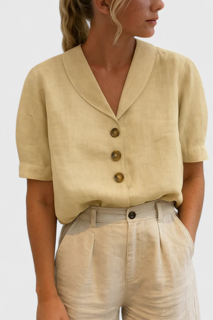 Elegant women's button-up blouse, versatile for summer fashion & spring wear. Stylish chic top for work or casual.