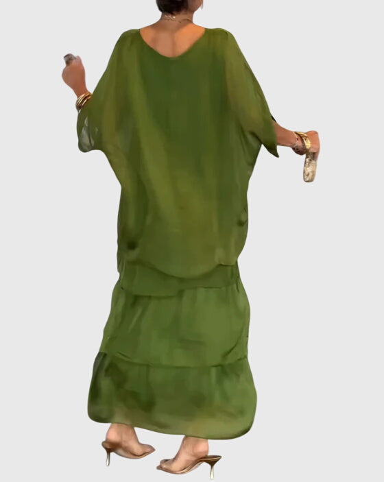 Chic women's formal maxi dress with a sophisticated button-up detail. Relaxed fit.