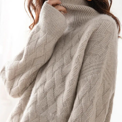 Cozy women's oversized turtleneck pullover, a warm and comfortable soft sweater for relaxed winter wear.