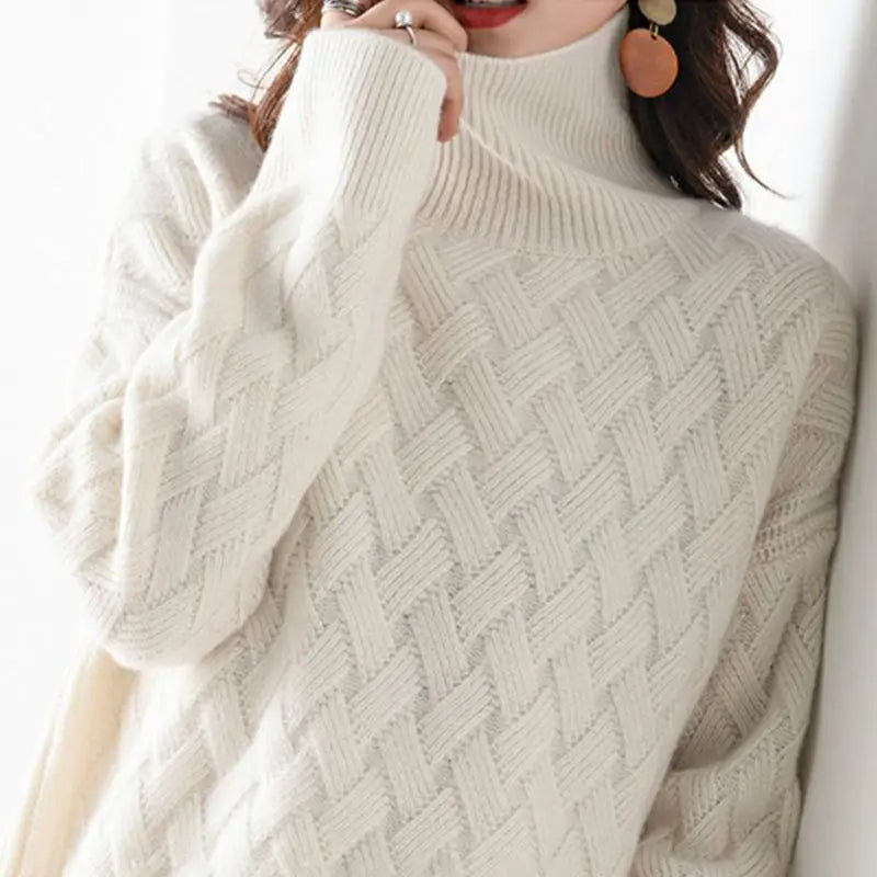 Soft women's turtleneck pullover. This warm, comfortable sweater features a unique cascade and chic chevron pattern.
