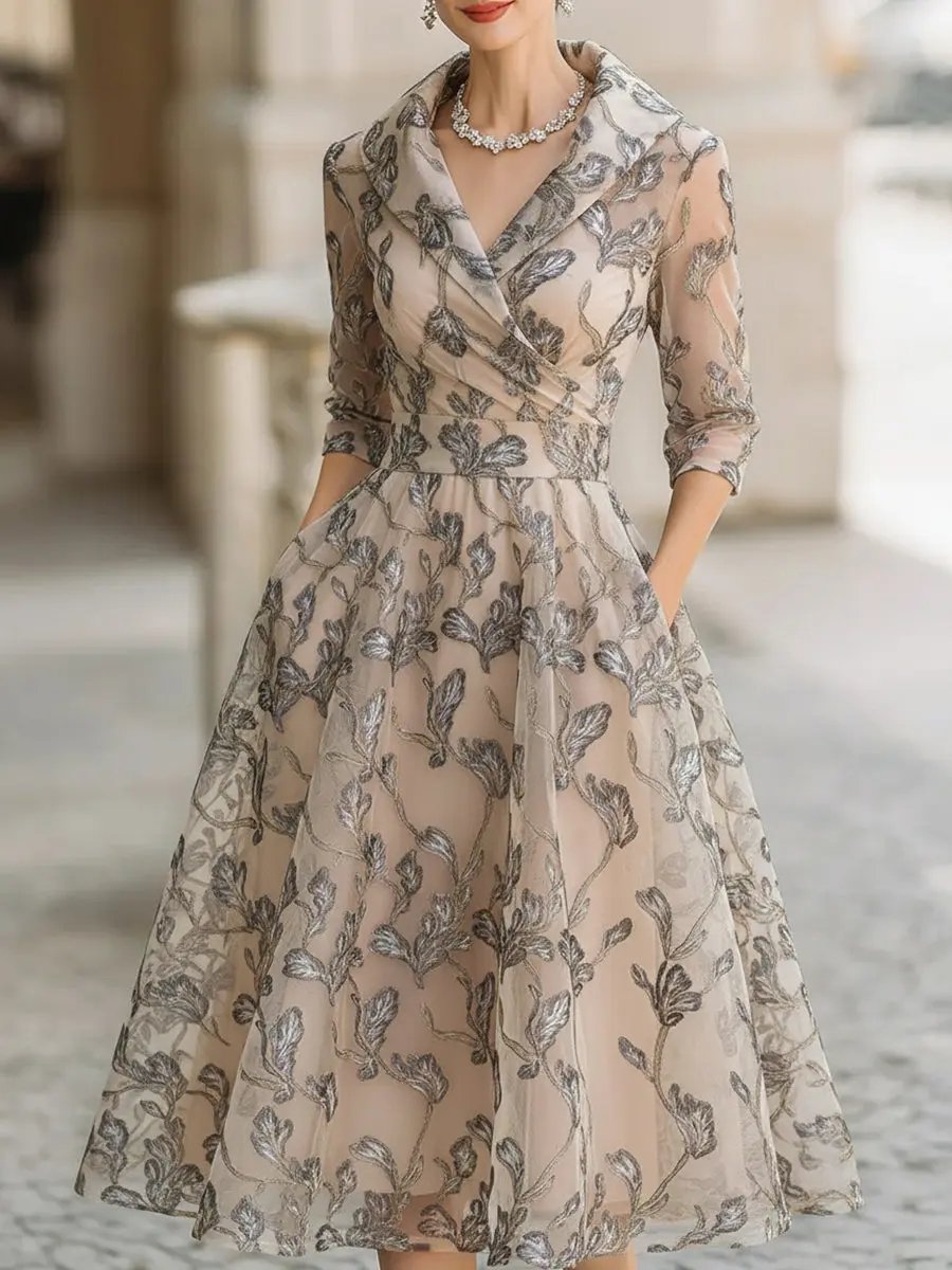 Elegant women's champagne short sleeve midi dress with graceful A-line silhouette and sophisticated leaf detail, perfect for parties.