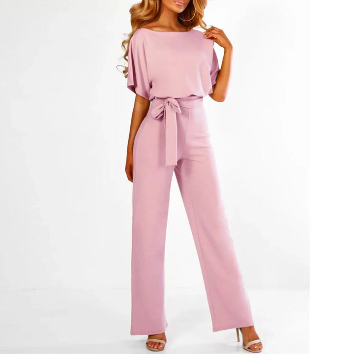 Stylish women's one-piece jumpsuit, an elegant back view for a modern party or formal event.