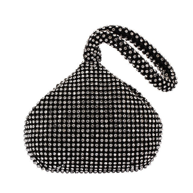 Chic gold women's mini crossbody bag. Elegant Chicago purse, a versatile accessory perfect for adding sparkle.