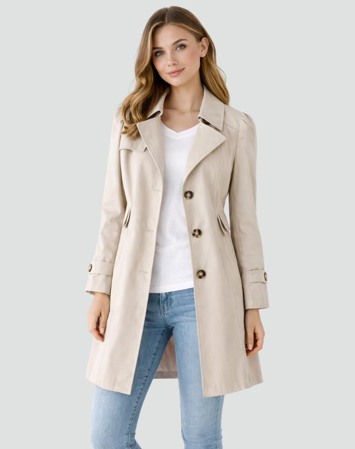 Sophisticated women's black trench coat, a classic tailored outerwear piece for elegant layering.