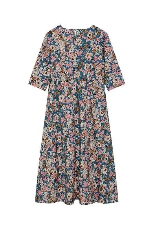 Effortless elegant women's classic midi dress featuring sophisticated button details. A flattering design for any occasion.