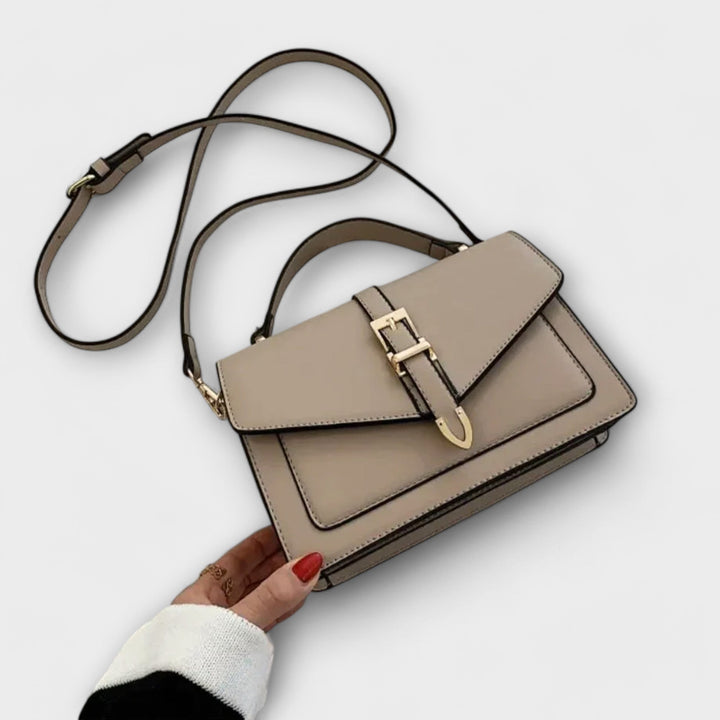 Elegant women's classic flap shoulder bag in a versatile color, perfect for everyday fashion and sophisticated style.