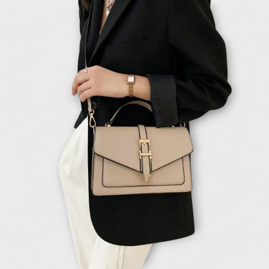 Stylish women's flap shoulder bag, a classic accessory for versatile everyday use, enhancing any elegant outfit.