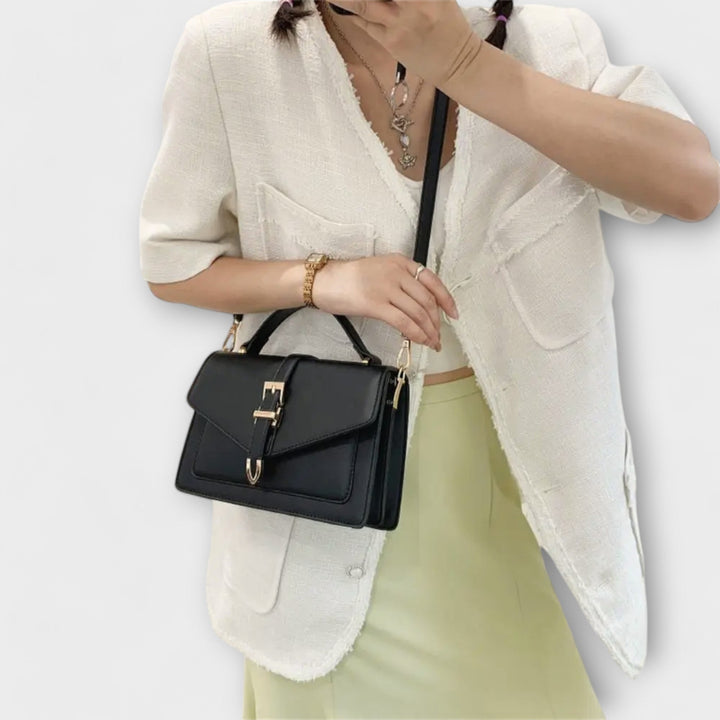 Beautiful women's everyday shoulder bag, featuring a classic flap design for an elegant, versatile fashion statement.