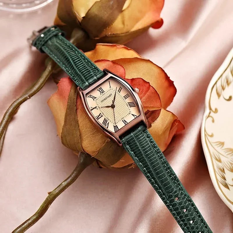 Elegant women's classic wristwatch with Roman numerals, polished finish. Perfect for formal wear.