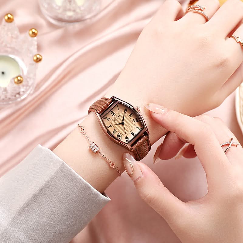 Women's classic wristwatch featuring elegant Roman numerals & polished finish. A timeless accessory.