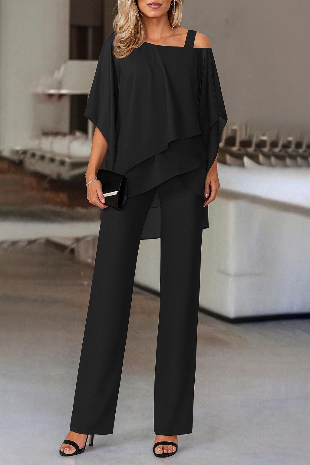 Stylish blue cold-shoulder two-piece pants set for women. A comfortable and elegant day-to-night outfit.