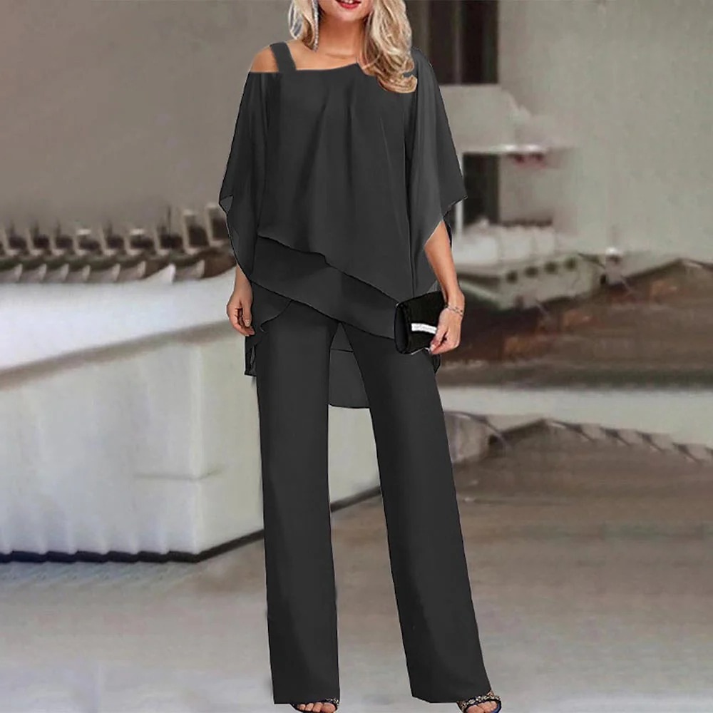 Modern women's elegant two-piece set with cold shoulder design. Perfect party outfit or formal wear.
