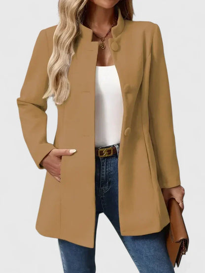 Elegant women's collarless jacket. Chic, modern style perfect for workwear & versatile layering.