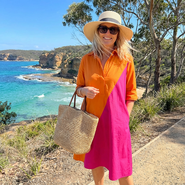 Stylish women's button-down color-block midi dress. Long sleeve A-line design for effortless elegance.